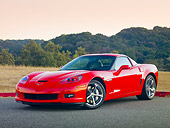 VET 01 RK0933 01
2010 Chevrolet Corvette Grand Sport Red 3/4 Front View On Pavement By Hills