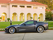 VET 01 RK0940 01
2010 Chevrolet Corvette ZR1 Gray Profile View On Pavement By Building
