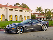 VET 01 RK0943 01
2010 Chevrolet Corvette ZR1 Gray 3/4 Front View On Pavement By Building