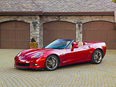 VET 01 RK0983 01
2011 Chevrolet Corvette GS Convertible Red 3/4 Front View On Brick By House