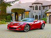 VET 01 RK0985 01
2011 Chevrolet Corvette GS Convertible Red 3/4 Front View On Brick By House