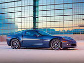 VET 01 RK0998 01
2011 Chevrolet Corvette Z06 Blue Profile View On Pavement By Building At Dusk