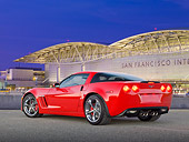 VET 01 RK1038 01
2012 Chevrolet Corvette Red 3/4 Rear View On Pavement By Airport At Night