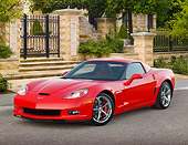 VET 01 RK1093 01
2012 Chevrolet Corvette Grand Sport Red 3/4 Front View On Pavement By Gated Building