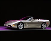 VET 01 RK0189 05
1998 Pewter Metallic Gray Chevy Corvette 3/4 Side On Gray Line Purple Shading And Floor Lights On Studio