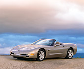VET 01 RK0192 03
1998 Chevrolet Corvette Convertible Pewter 3/4 Side View On Pavement Gray Clouds