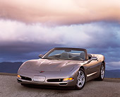 VET 01 RK0195 03
1998 Chevrolet Corvette Convertible Pewter 3/4 Front View On Pavement Gray Clouds