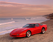 VET 01 RK0332 05
1990 Chevrolet Corvette Shinoda Red Side 3/4 View On Sand