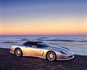 VET 01 RK0387 02
1998 Chevrolet Corvette Callaway C12 Silver 3/4 Side View On Beach At Dusk