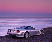 VET 01 RK0395 01
1998 Chevrolet Corvette Callaway C12 Silver 3/4 Rear View On Sand By Ocean Filtered