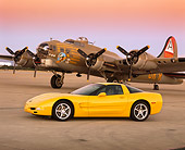 VET 01 RK0442 02
2000 Chevrolet Corvette C5 Yellow 3/4 Front View On Pavement By Airplane Filtered