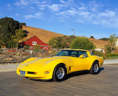 VET 01 RK0462 02
1981 Chevrolet Corvette Yellow 3/4 Front View On Bridge By Barn