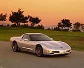 VET 01 RK0507 02
2001 Chevrolet Corvette Z06 Silver 3/4 Front View On Pavement By Grass Filtered