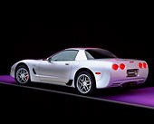 VET 01 RK0511 06
2001 Chevrolet Corvette Z06 Silver 3/4 Rear View On Purple Floor Gray Line Studio