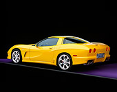 VET 01 RK0556 09
2002 Chevrolet Corvette Z06 Avelate Yellow 3/4 Rear View On Gray Line Studio