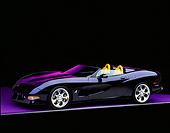 VET 01 RK0560 02
2002 Chevrolet Corvette Speedster Purple Blue 3/4 Side View On Purple Floor And Lighting Studio
