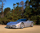 VET 01 RK0583 01
2002 Chevrolet Corvette Z06 Silver 3/4 Low Front View On Pavement