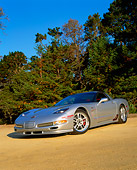 VET 01 RK0584 01
2002 Chevrolet Corvette Z06 Silver Low Slanted 3/4 Front View On Sand