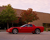 VET 01 RK0622 02
2004 Chevrolet Corvette Z06 Red Profile View On Pavement By Building