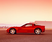 VET 01 RK0680 03
2005 Chevy Corvette C6 Red Profile View On Pavement