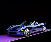 VET 01 RK0691 07
2005 Chevrolet Corvette C6 Convertible Blue 3/4 Front View On Purple Floor Gray Line Studio