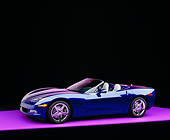 VET 01 RK0693 08
2005 Chevrolet Corvette C6 Convertible Blue 3/4 Side View On Purple Floor Studio