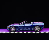 VET 01 RK0694 06
2005 Chevrolet Corvette C6 Convertible Blue Profile View On Purple Floor Checkered Line Studio