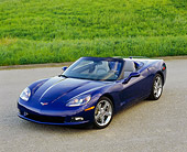 VET 01 RK0700 01
2005 Chevrolet Corvette C6 Convertible Blue Overhead Front 3/4 View On Pavement By Grass