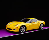 VET 01 RK0734 09
2006 Chevrolet, Corvette, Z06, Yellow 3/4 Side View On Purple Floor Studio
