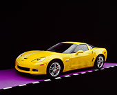 VET 01 RK0737 08
2006 Chevrolet, Corvette, Z06, Yellow 3/4 Side View On Purple Floor Checkered Line Studio