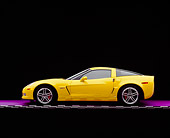 VET 01 RK0738 07
2006 Chevrolet, Corvette, Z06, Yellow Profile View On Purple Floor Checkered Line Studio