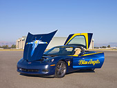 VET 01 RK0741 01
2005 Chevrolet Corvette C6 Lemans Blue 3/4 Front View On Pavement Doors And Hood Open