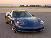 VET 01 RK0748 01
2005 Chevrolet Corvette C6 Lemans Blue 3/4 Front View On Pavement At Dusk