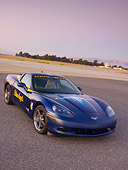 VET 01 RK0752 01
2005 Chevrolet Corvette C6 Lemans Blue 3/4 Front View On Pavement At Dusk
