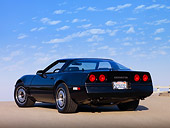 VET 01 RK0817 01
1984 Chevrolet Corvette Coupe Black 3/4 Rear View On Pavement Blue Sky