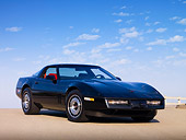 VET 01 RK0827 01
1984 Chevrolet Corvette Coupe Black 3/4 Front View On Pavement Blue Sky
