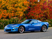 VET 01 RK0831 01
2008 Chevrolet Corvette Z06 Coupe Blue 3/4 Front View On Pavement By Autumn Trees