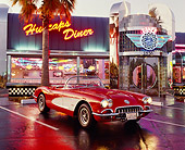 VET 02 RK0009 06
1958 Chevy Corvette Fuel Injected Red And White 3/4 Front In Prking Lot In Front Of Diner
