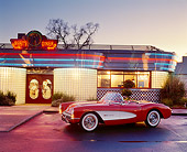 VET 02 RK0056 02
1957 Chevrolet Corvette Convertible Red And White Side 3/4 View In Front Of Diner