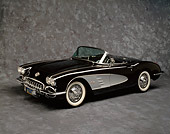 VET 02 RK0101 05
1959 Chevrolet Corvette Convertible Roadster Black And Gray 3/4 Side View On Gray Mottled Background