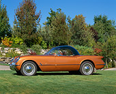 VET 02 RK0255 04
1955 Chevrolet Corvette Bubble Top Copper Profile View On Grass