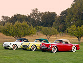 VET 02 RK0338 01
1953, 1954, 1955 Chevrolet Corvette Convertibles White, Red, Yellow 3/4 Front View On Grass By Trees
