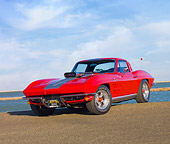 VET 03 RK0645 01
1964 Chevrolet Corvette Stingray Red With Silver Stripe 3/4 Front View On Pavement By Water