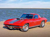 VET 03 RK0647 01
1964 Chevrolet Corvette Stingray Red With Silver Stripe 3/4 Front View On Pavement By Water