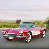 VET 03 RK0667 01
1961 Chevrolet Corvette Convertible Maroon And White 3/4 Front View On Pavement