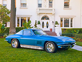 VET 03 RK0671 01
1967 Chevrolet Corvette Blue 3/4 Front View On Grass By House