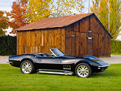 VET 03 RK0680 01
1968 Chevrolet Corvette Black 3/4 Front View On Grass By Barn