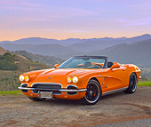 VET 03 RK0695 01
1962 Chevrolet Corvette Convertible Orange 3/4 Front View On Pavement By Hills