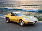 VET 03 RK0725 01
1969 Chevrolet Corvette L88 Gold 3/4 Front View On Pavement By Ocean At Dusk