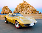 VET 03 RK0728 01
1969 Chevrolet Corvette L88 Gold 3/4 Front View On Pavement By Red Rock And Ocean